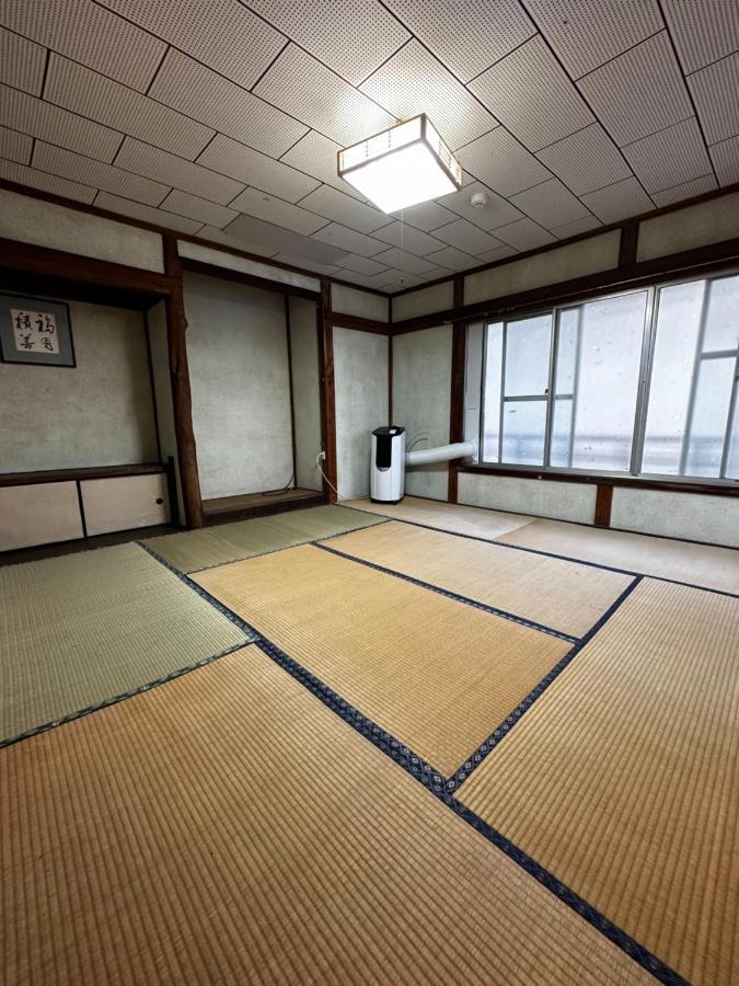 素泊まり民宿とみや Oshima Luaran gambar